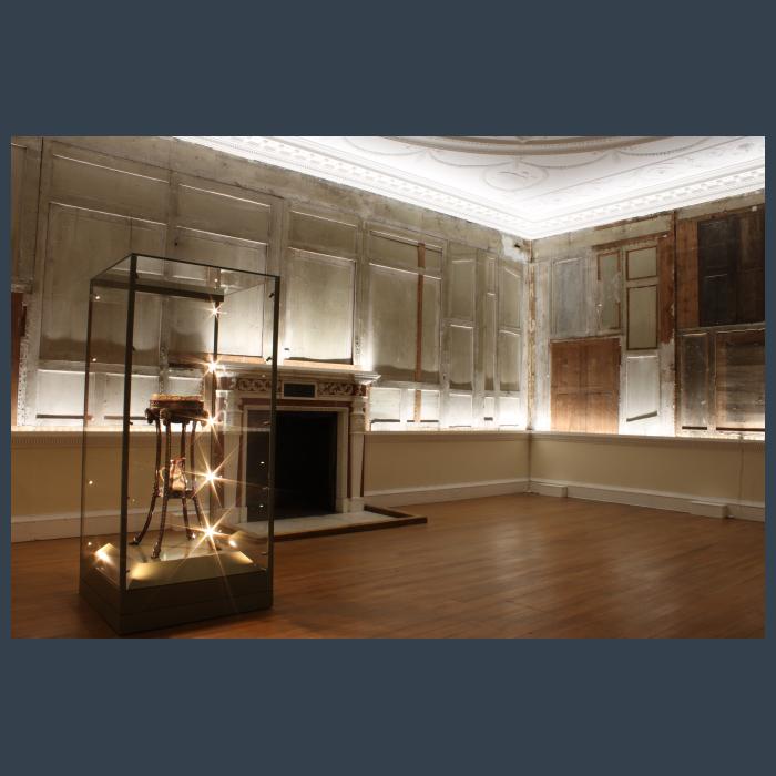 The tapestry room at Croome with plasterboard removed and dramatic lighting added